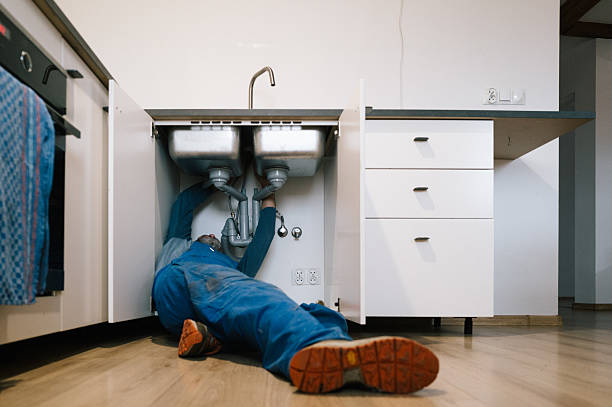 Professional Emergency Plumber technician working in Wentworth, NC